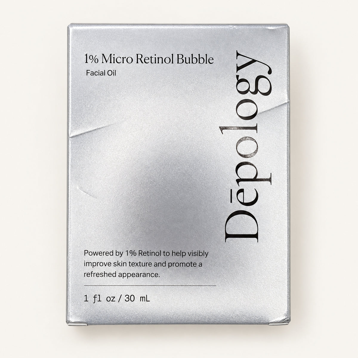 Depology 1% Micro Retinol Bubble Facial Oil 30 ml - przód srebrnego pudełka z nazwą produktu | Ellemania