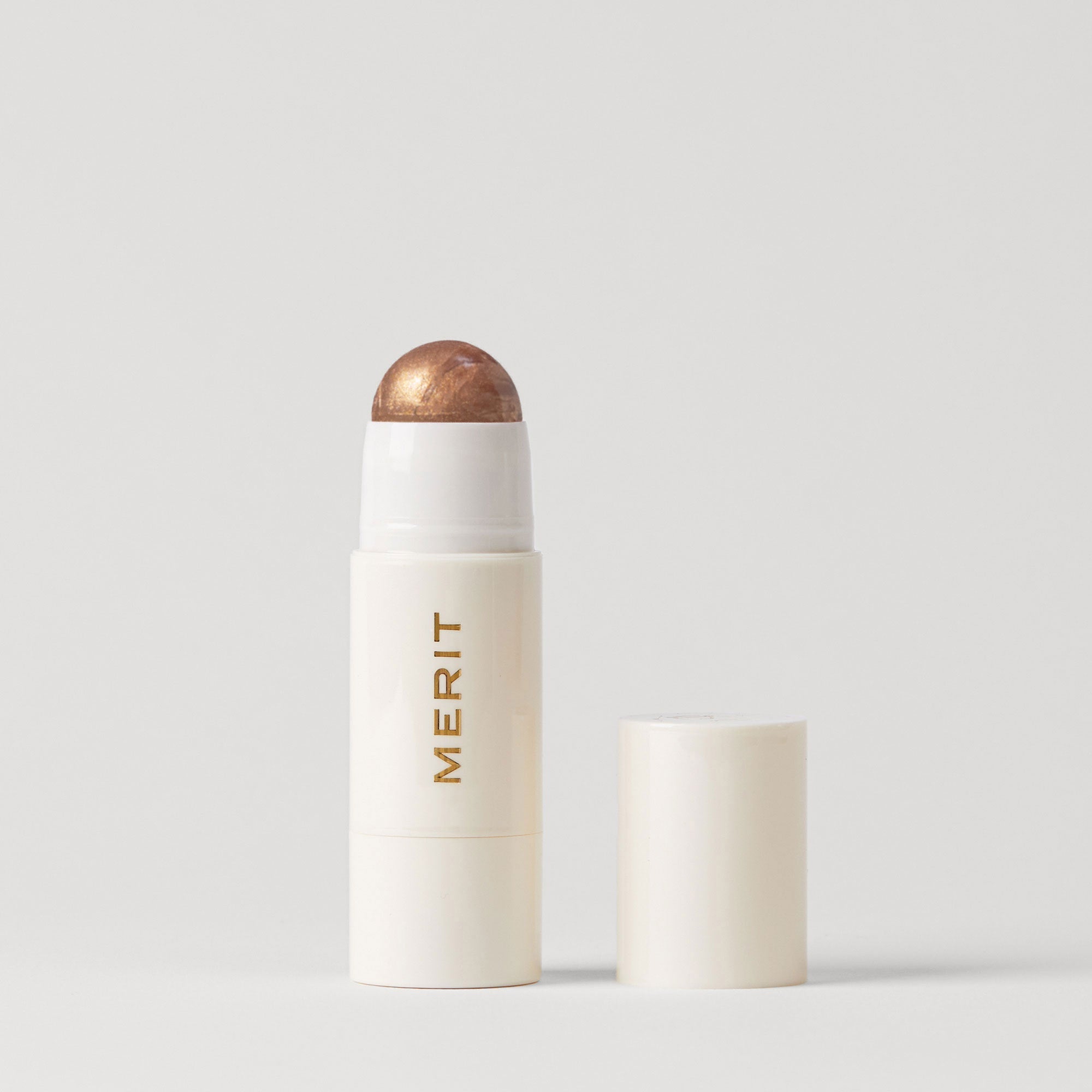 Merit Beauty Day Glow Highlighting Balm - rozświetlający balsam w sztyfcie ze skwalanem 4 g