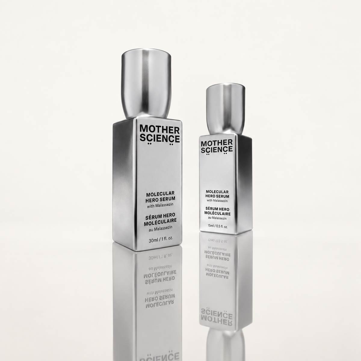Mother Science Molecular Hero Serum - dwie srebrne butelki, 30 ml i 15 ml, ustawione obok siebie | Ellemania