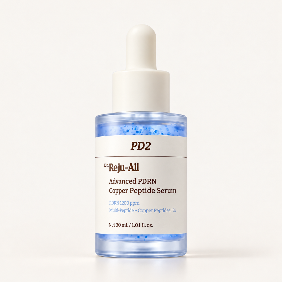 Dr. Reju-All Advanced PDRN Copper Peptide Serum 30 ml - dropper bottle with blue capsules in the serum, front view | Ellemania