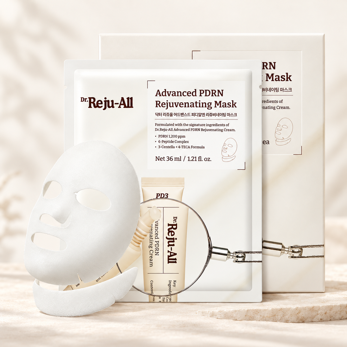 Dr. Reju-All Advanced PDRN Rejuvenating Mask 36 ml - dwie saszetki za białą płachtą maski z paskiem na szyję na jasnej podstawce | Ellemania