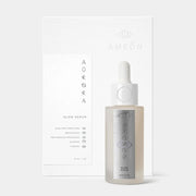 AMEON Aurora Glow Serum 30 ml, pudełko z przodu i butelka z pipetą obok | Ellemania
