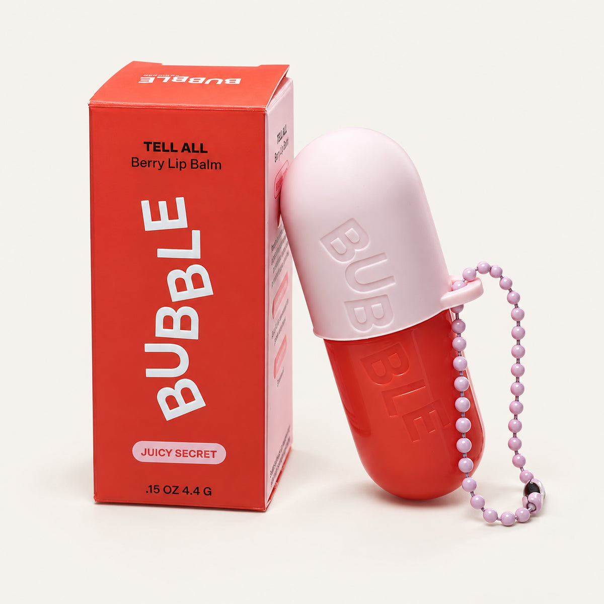 Bubble Tell All Lip Balm 4,4 g, red box and capsule-shaped container with a chain | Ellemania