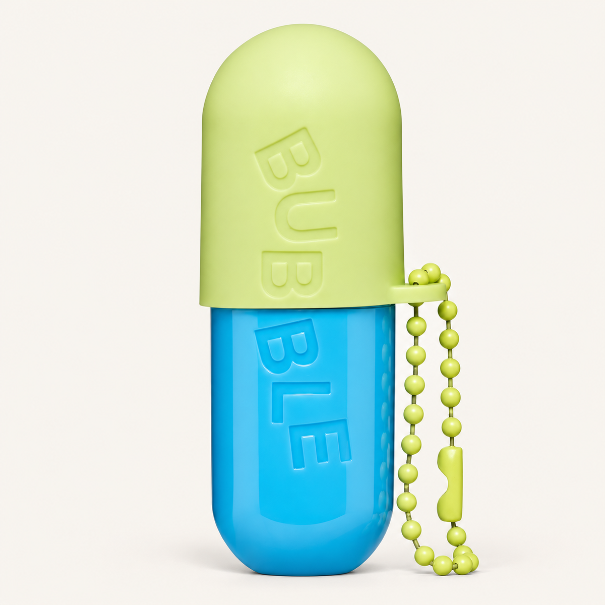 Bubble Tell All Lip Balm 4,4 g, lime and blue capsule-shaped container with a lime chain | Ellemania