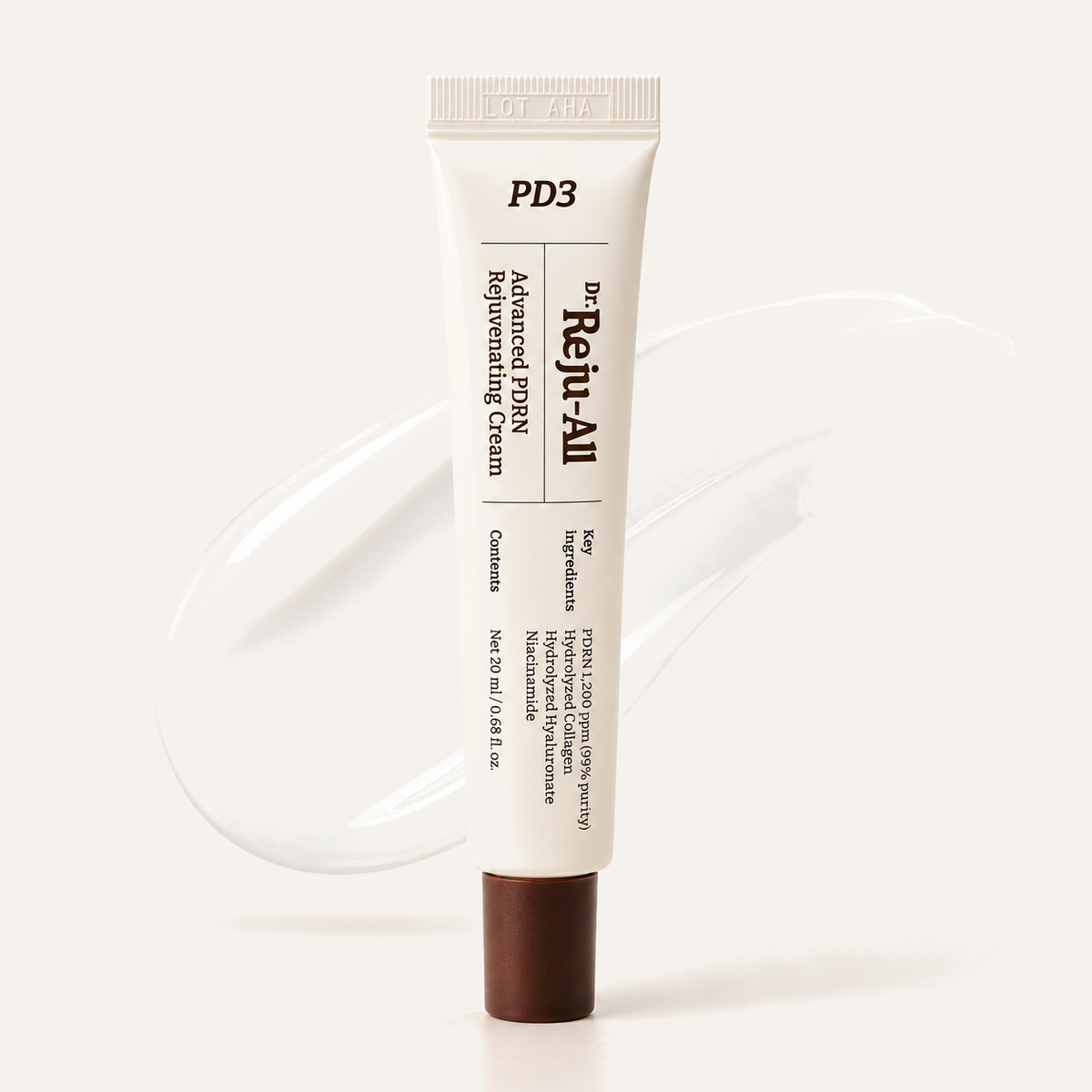 Dr. Reju-All Advanced PDRN Rejuvenating Cream 20 ml, tubka z przodu z ciemną końcówką i tekstura kremu za nią | Ellemania