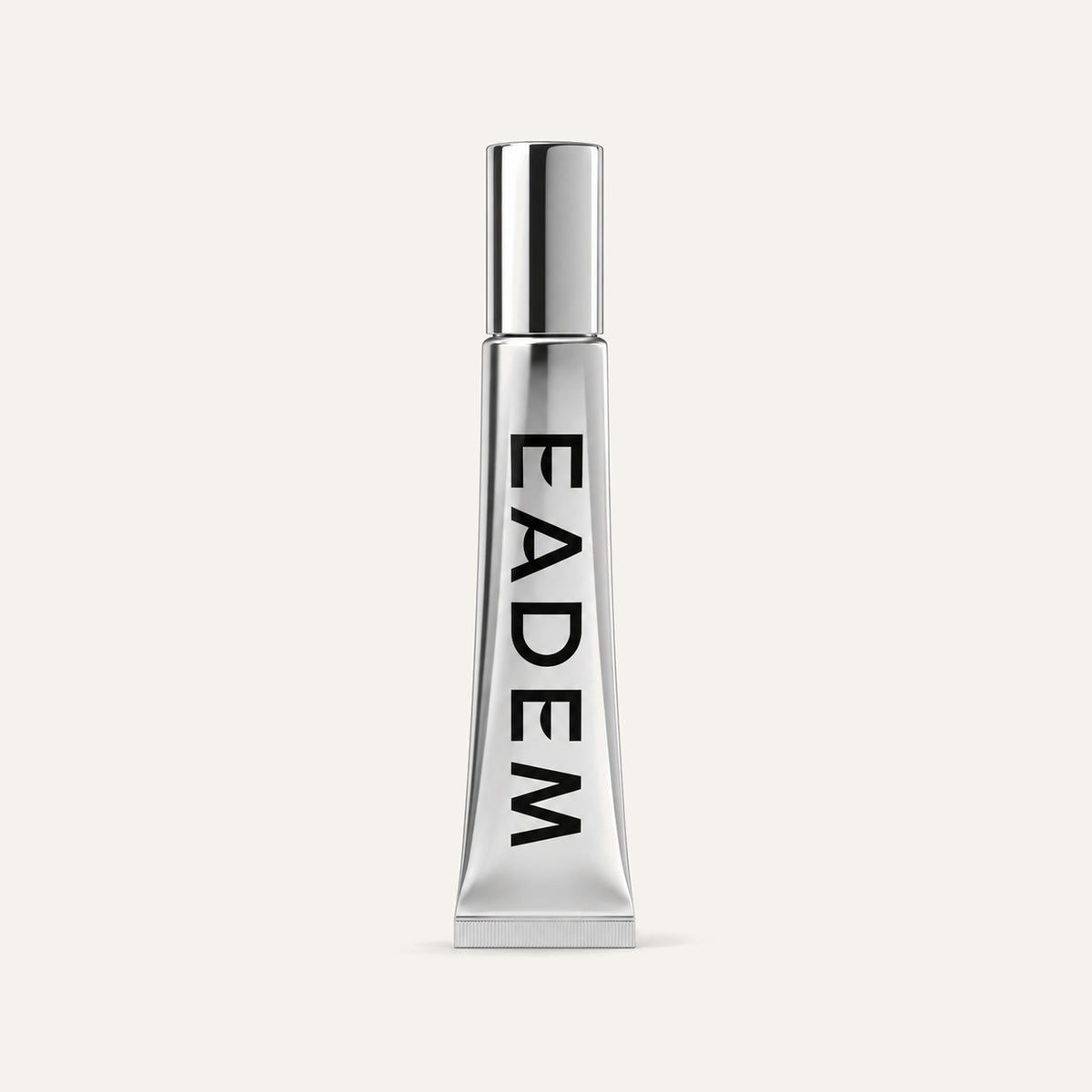 Eadem Le Chouchou Lip Softening Balm 14 ml, silver tube with a black logo, front view | Ellemania