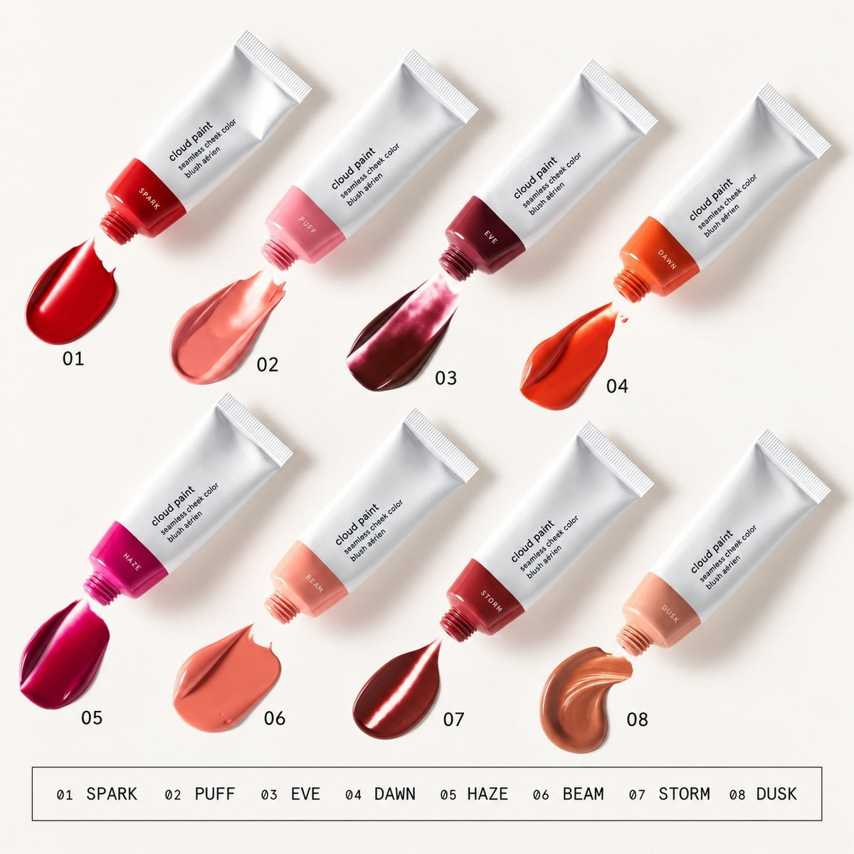 Glossier Cloud Paint - widok z góry na osiem tubek z próbkami koloru, pod spodem ponumerowana lista odcieni Spark, Puff, Eve, Dawn, Haze, Beam, Storm, Dusk | Ellemania
