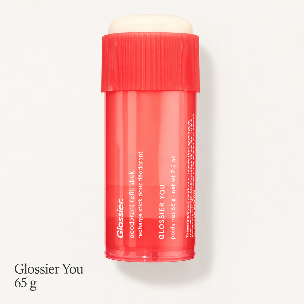 Glossier Deodorant Refill Stick - zapach Glossier You, czerwony wkład w sztyfcie z napisem Glossier You i 65 g na jasnym tle | Ellemania
