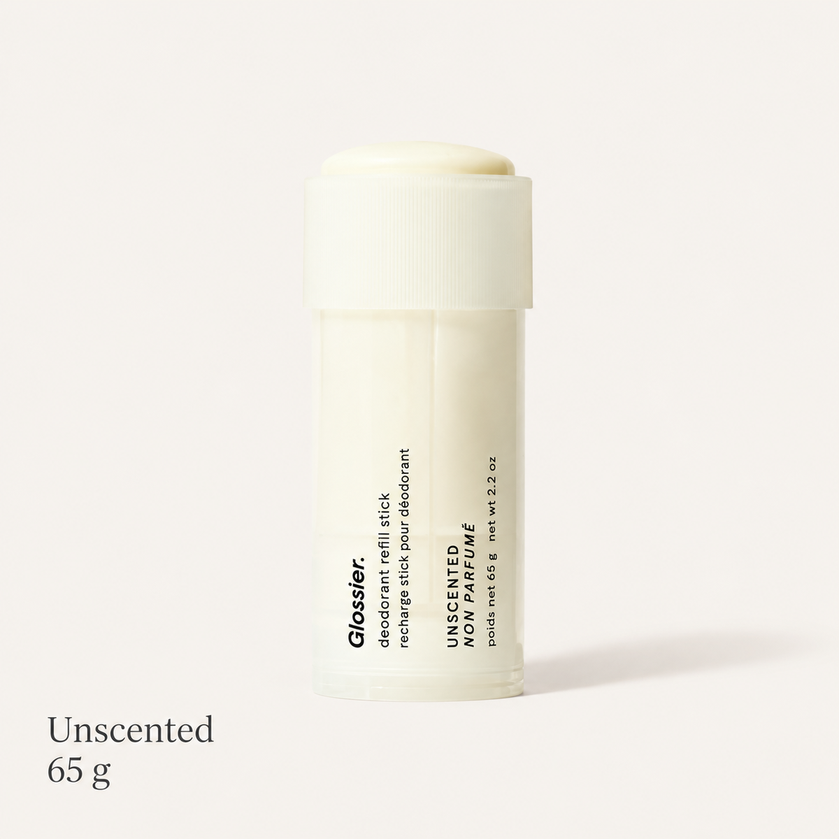 Glossier Deodorant Refill Stick - zapach Unscented, kremowobiały wkład w sztyfcie z napisem Unscented i 65 g na jasnym tle | Ellemania