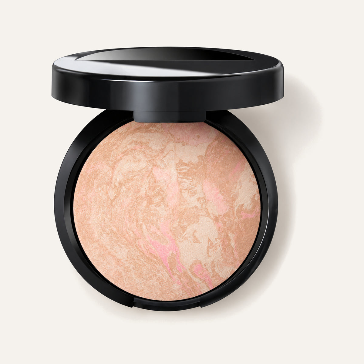 Laura Geller Baked Balance-n-Brighten Color Correcting Foundation, open black compact with marbled foundation | Ellemania