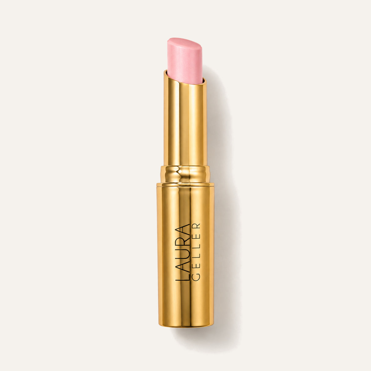 Laura Geller Jelly Balm Hydrating Lip Color Sheerly Amazing - złoty sztyft z przezroczystym, neutralnym balsamem | Ellemania