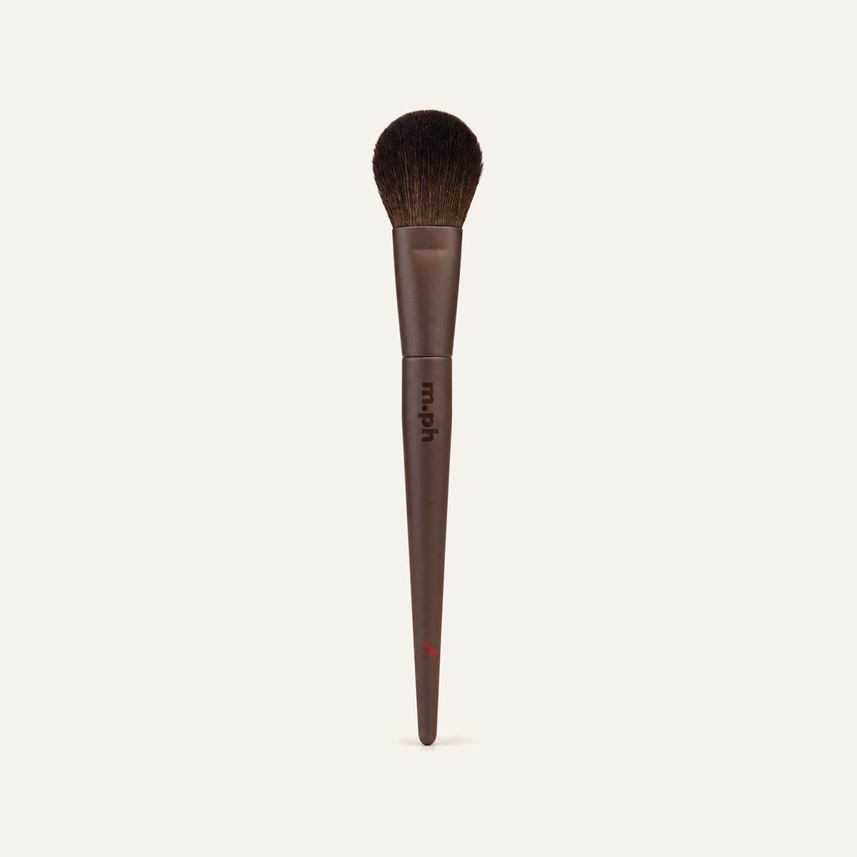 m.ph by Mary Phillips The Cream Blush Brush 1 pc, brush with a dark brown handle, front view | Ellemania