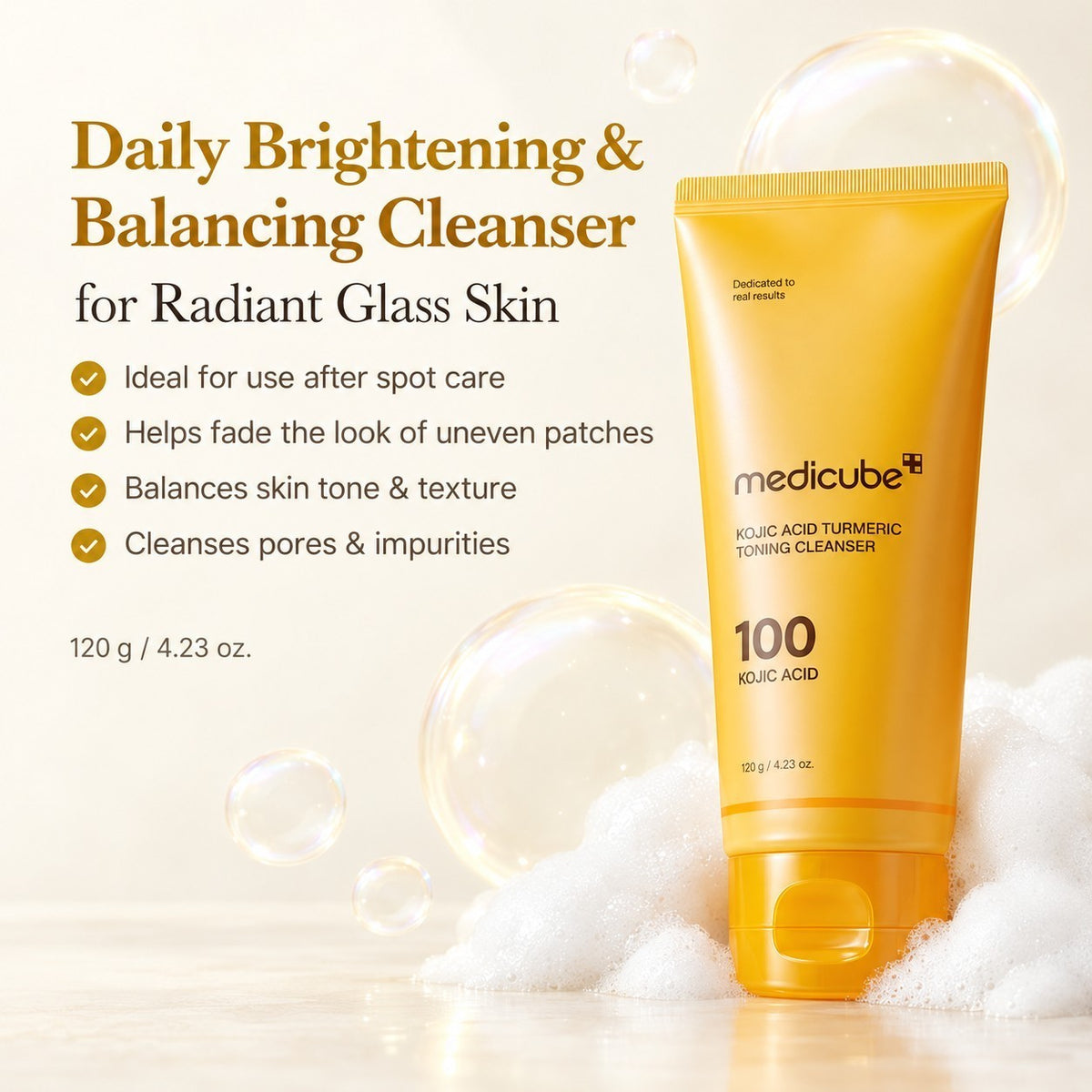 Medicube Kojic Acid Turmeric Toning Cleanser - żółta tuba z pianą i bańkami, grafika producenta z listą cech | Ellemania