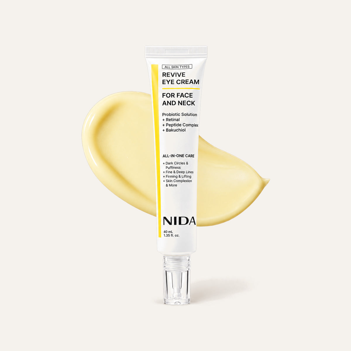 Nida Revive Eye Cream For Face & Neck 40 ml, yellow and white tube with a dispenser next to a cream swatch | Ellemania