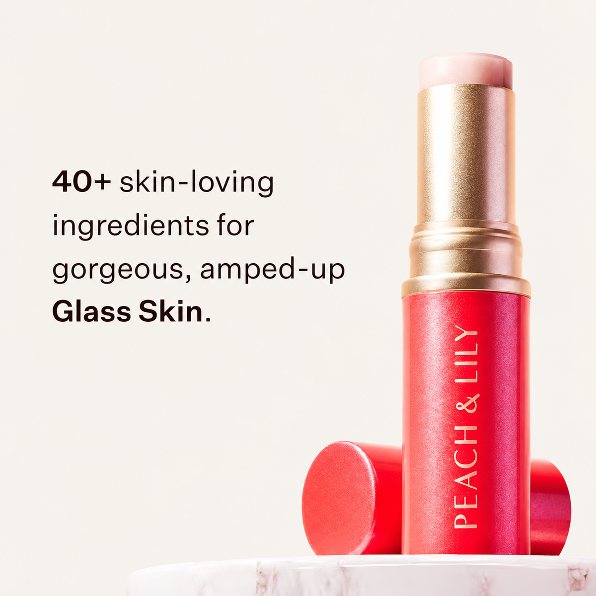 Peach & Lily Glass Skin Luminizing Stick - grafika z czerwonym sztyftem na marmurowym podeście i napisem | Ellemania