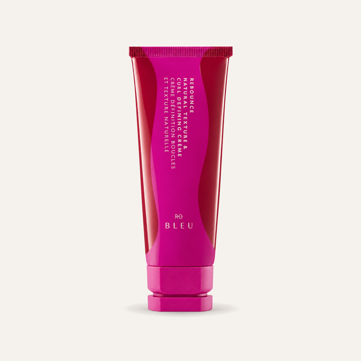 R+Co Bleu Rebounce Natural Texture and Curl Defining Creme 148 ml, burgundy tube, front view | Ellemania