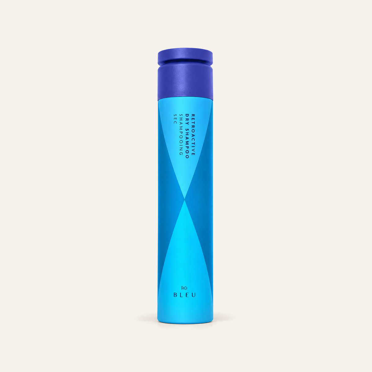 R+Co Bleu Retroactive Dry Shampoo, blue spray bottle, front view | Ellemania