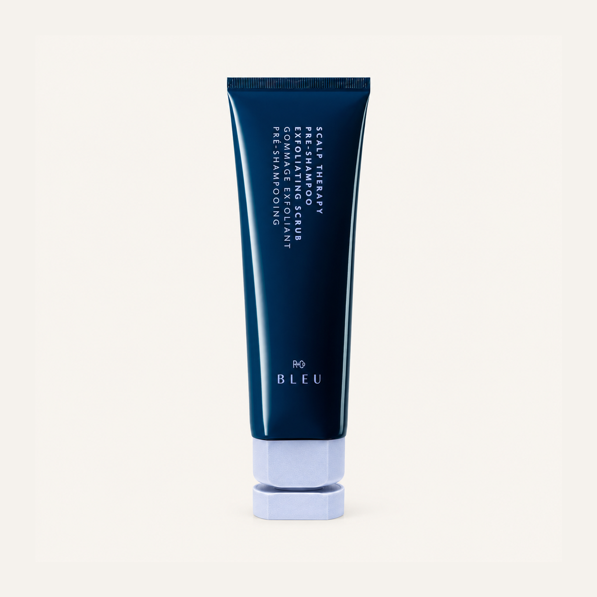 R+Co Bleu Scalp Therapy Pre Shampoo Exfoliating Scrub 124 ml, navy tube, front view | Ellemania