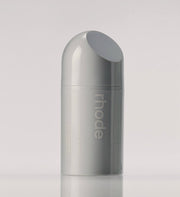 Szare opakowanie serum Rhode Skin Peptide Glazing Fluid marki ellemania z pompką do pielęgnacji twarzy