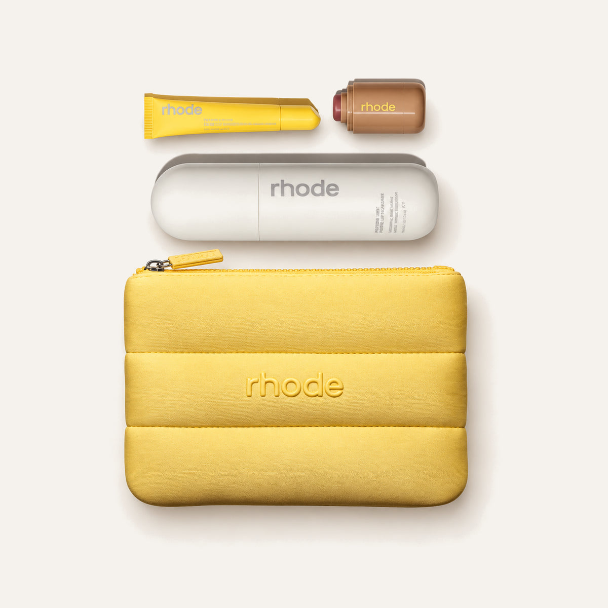 Rhode Summer Kit, yellow pouch, case and mini products, front view | Ellemania