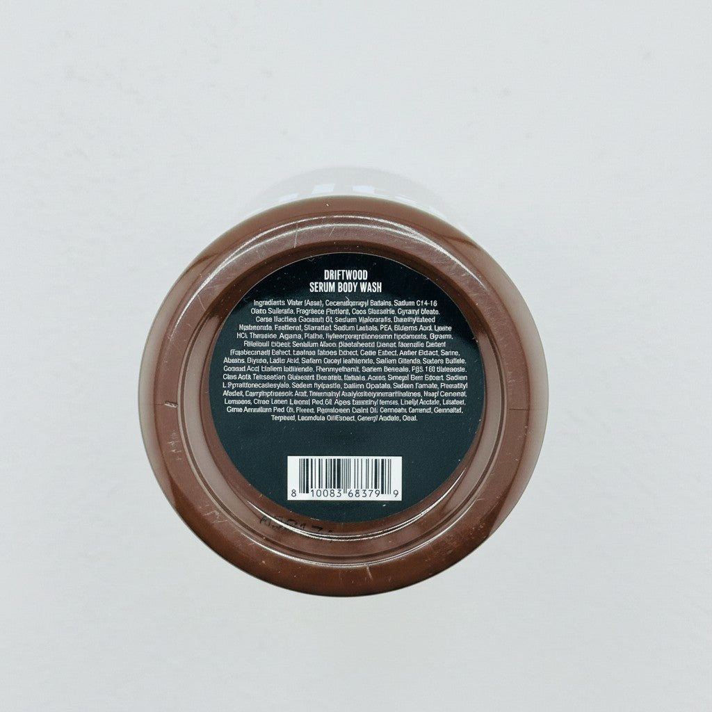 Etykieta z tyłu butelki żelu pod prysznic ellemania Saltair Driftwood Serum Body Wash z listą składników INCI.