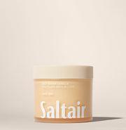 Słoiczek masła do ciała Saltair Multi-Lipid Body Butter w zapachu Salt Water Vanilla od ellemania na beżowym tle.