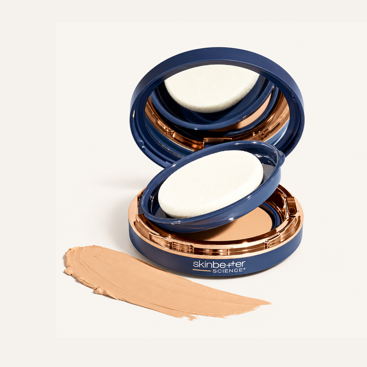 Skinbetter Science Tone Smart SPF 68 Sunscreen Compact 12 g, open compact with sponge against a powder swatch | Ellemania