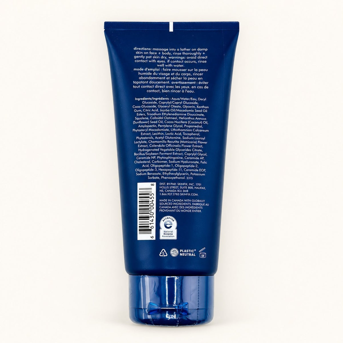 Skinfix Pre-Biotic Foaming Oil Cleanser - tył granatowej tuby z instrukcją, listą składników INCI i kodem kreskowym | Ellemania