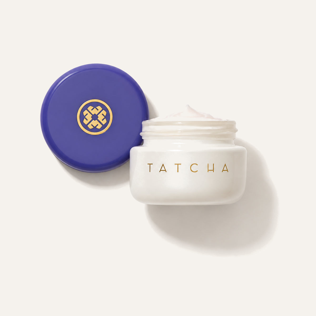 Tatcha Ageless Enriching Renewal Cream Mini, open small jar of cream with a purple lid | Ellemania
