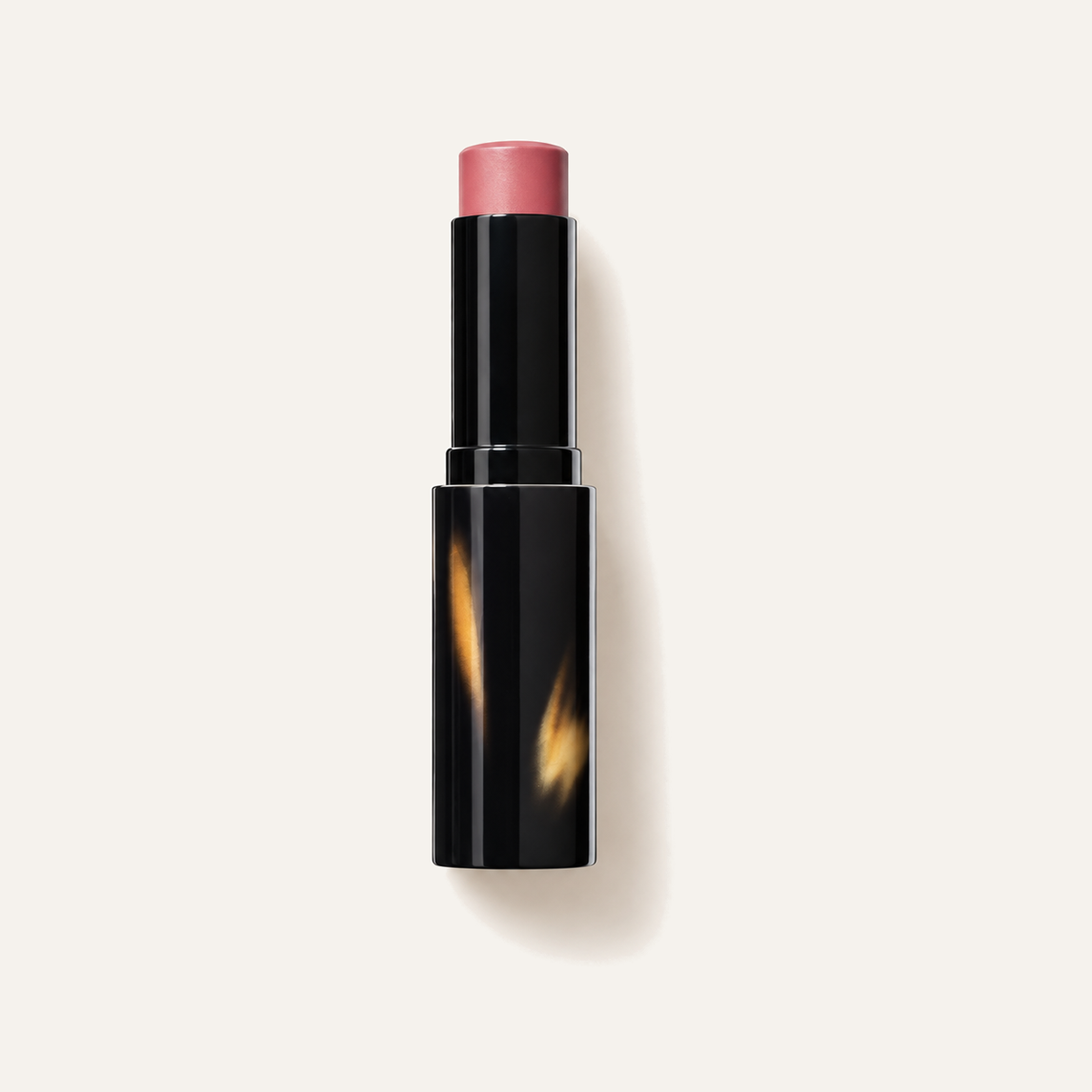 Victoria Beckham Beauty Cheeky Posh Cream Blush Stick, open black blush stick, front view | Ellemania