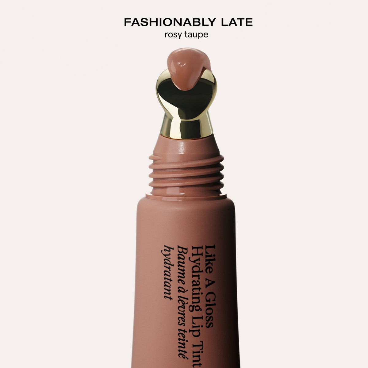 YSE Beauty Like A Gloss Hydrating Lip Tint, odcień Fashionably Late, tubka z aplikatorem i kroplą produktu na końcówce | Ellemania