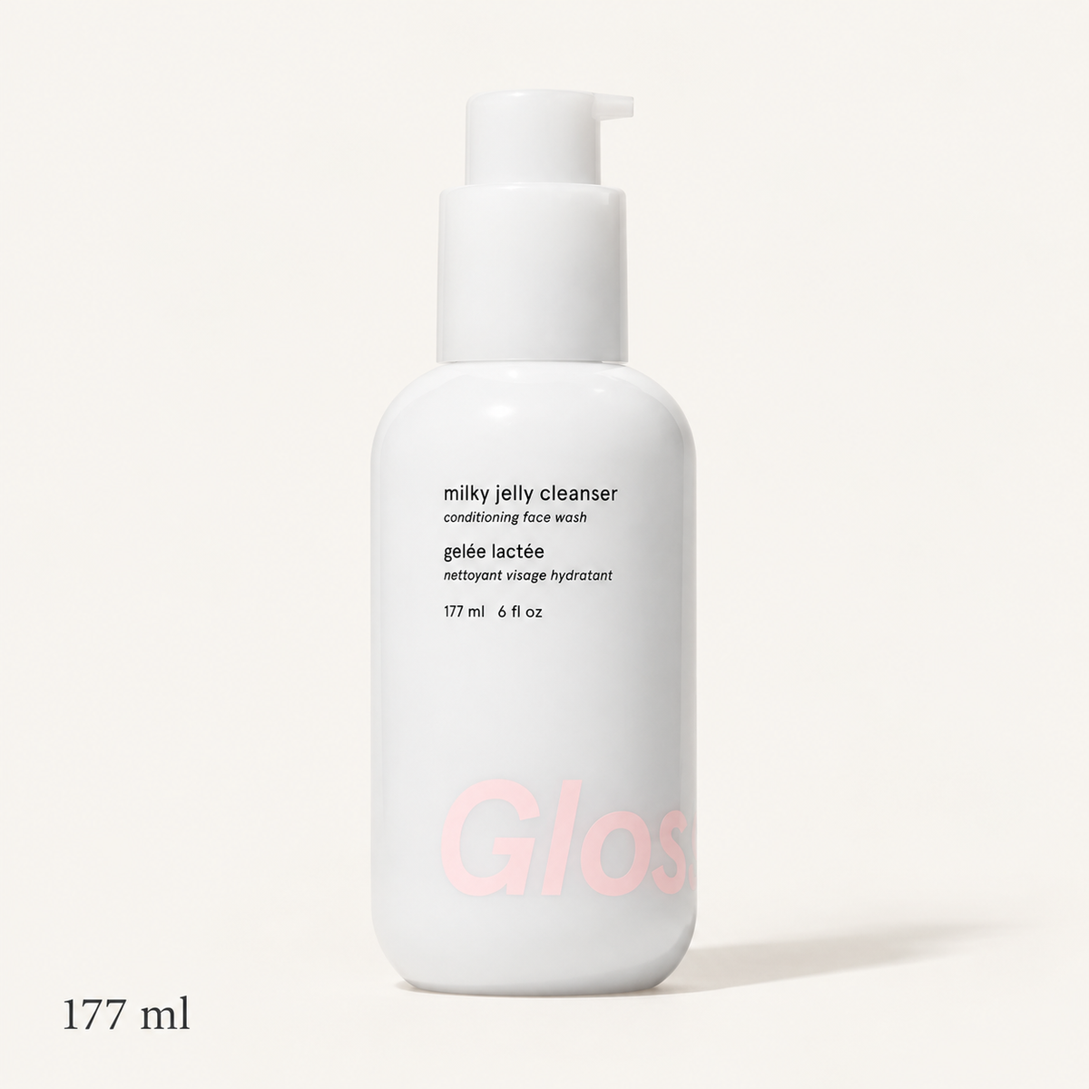Glossier Milky Jelly Cleanser - biała butelka 177 ml z pompką i napisem milky jelly cleanser, podpis 177 ml, jasne tło | Ellemania