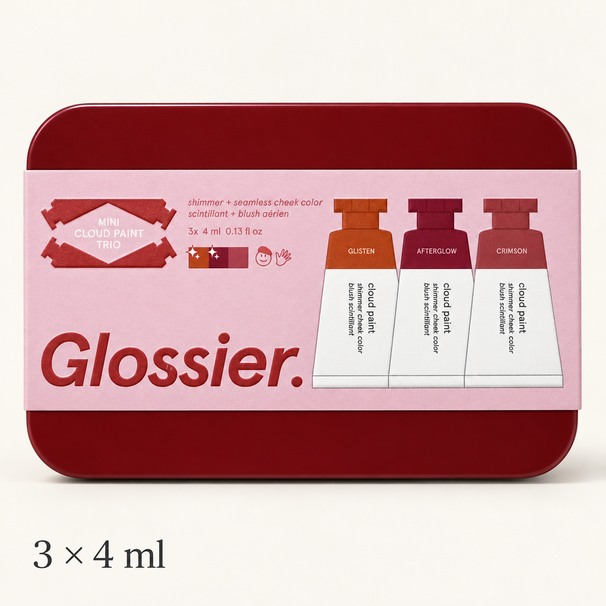 Glossier Mini Cloud Paint Trio - czerwone metalowe pudełko z różowym paskiem z napisem Mini Cloud Paint Trio i trzema tubkami opisanymi Glisten, Afterglow i Crimson, napis 3 × 4 ml na jasnym tle | Ellemania