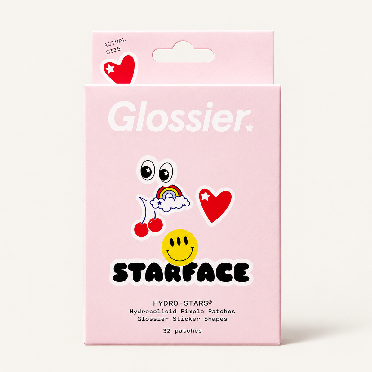 Glossier x Starface Hydro-Stars - różowe pudełko widoczne z przodu z napisem 32 patches oraz kolorowymi naklejkami w kształcie oczu, tęczy, serca, wiśni i uśmiechniętej buźki na jasnym tle | Ellemania