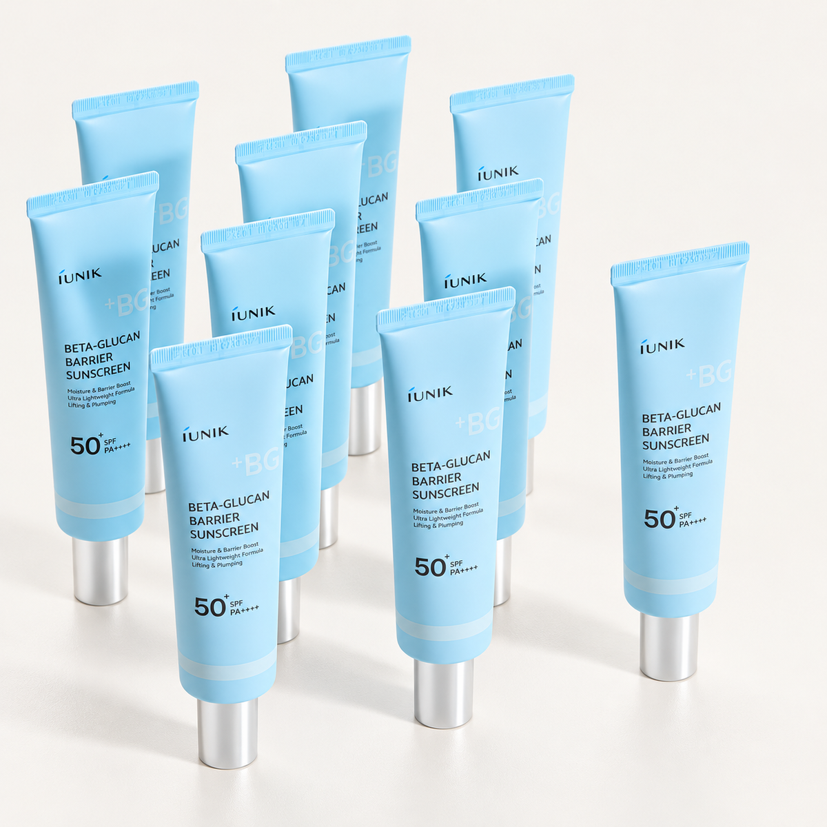 IUNIK Beta-Glucan Barrier Sunscreen - grupa tubek ustawionych na jasnym tle | Ellemania