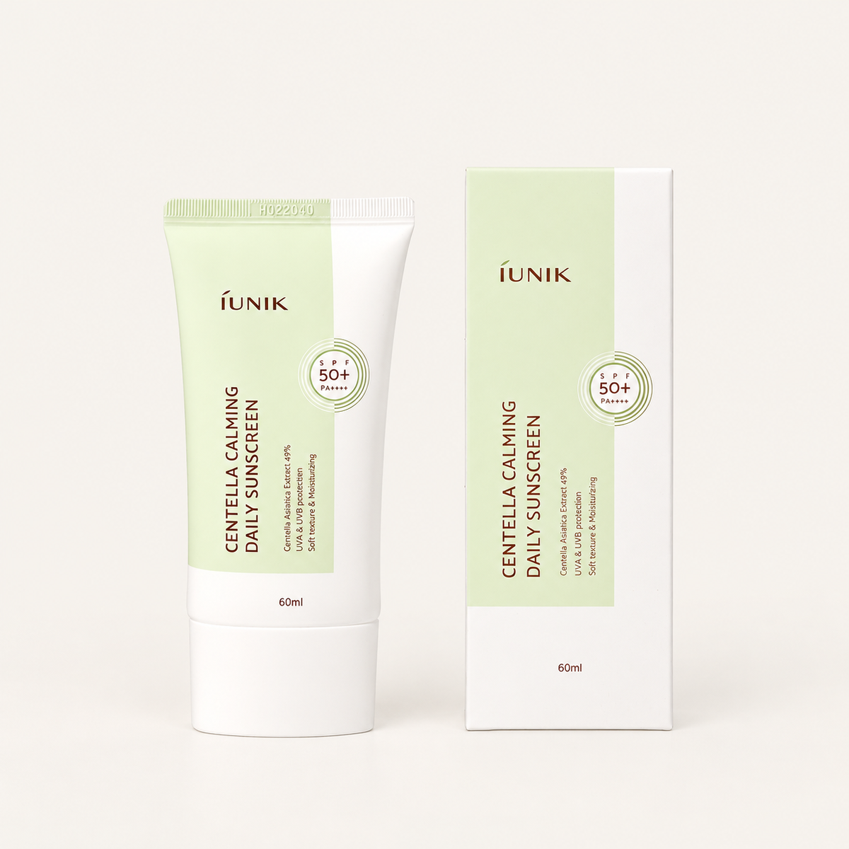 IUNIK Centella Calming Daily Sunscreen - tubka i pudełko obok siebie, widok z przodu | Ellemania